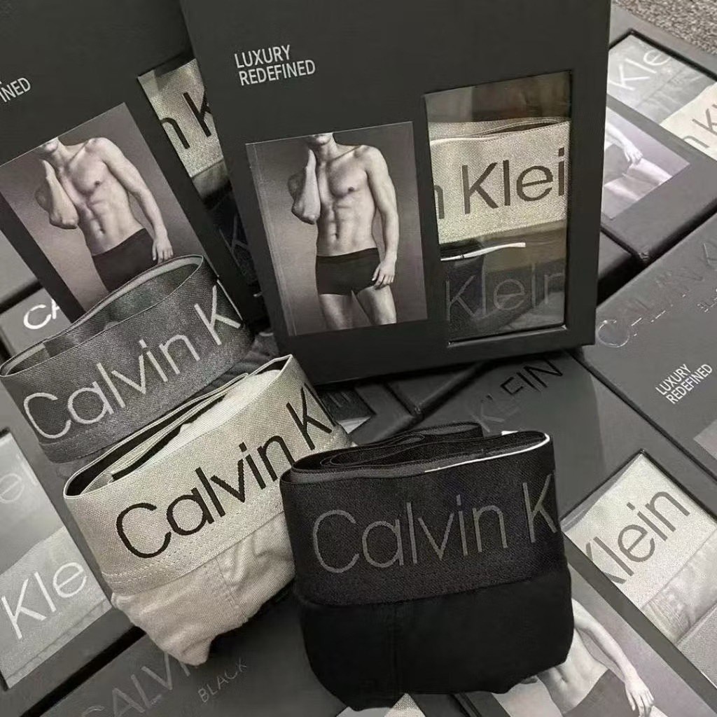 使用者提供的 CK 三件裝商品示意照片,素色品牌腰帶與盒裝外觀